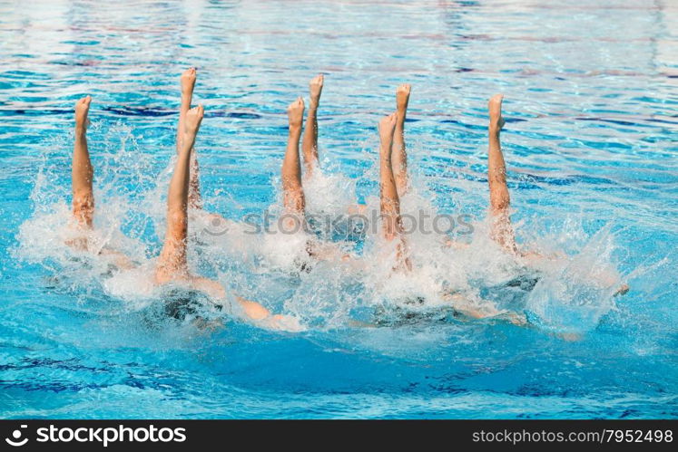 Synchronized swimmer legs movement