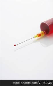 Syringe filled with blood, close-up