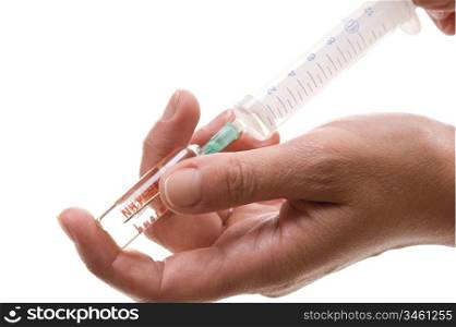 syringe in hand isolated on a white background