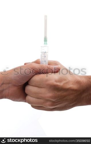 syringe in two hands isolated on white