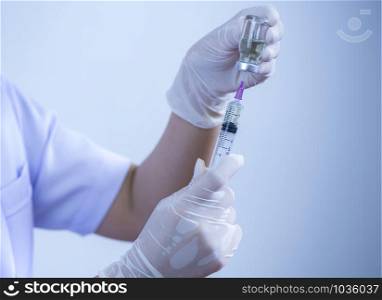 Syringe, medical injection, bottle, ampule in hand Medicine vaccination equipment with needle doctor. Liquid drug or narcotic