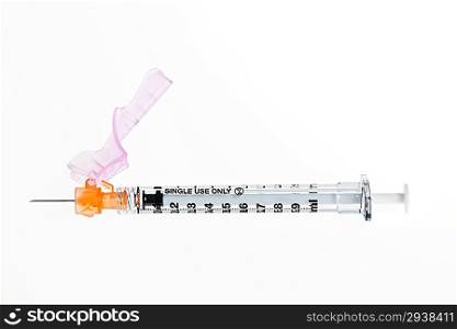 Syringe over white