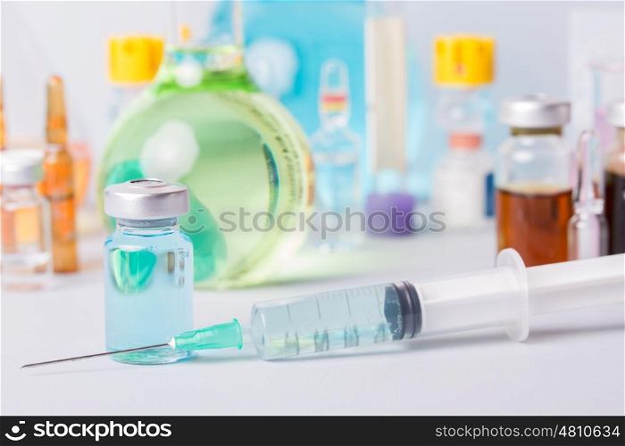 syringe with ampules of drugs