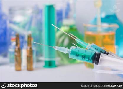syringe with ampules of drugs