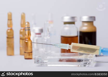 syringe with ampules of drugs