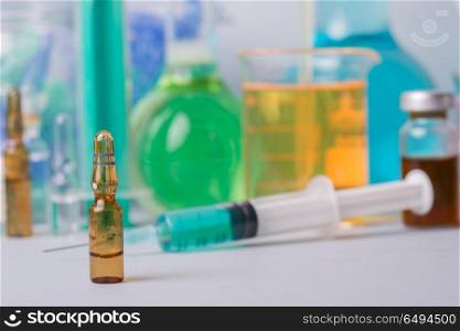 syringe with ampules of drugs. drugs