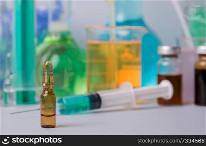 syringe with&ules of drugs