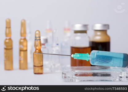 syringe with&ules of drugs