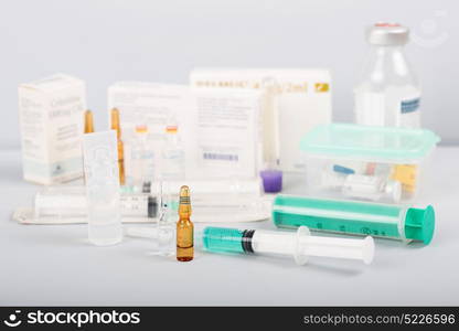 syringes with ampules of drugs