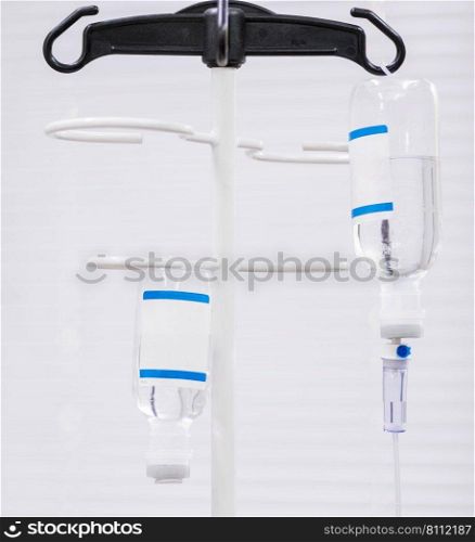 system with dropper and solution, close-up. dropper with saline solution