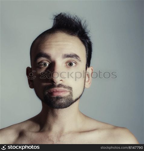 Syudio portrait of Half shaved male closeup