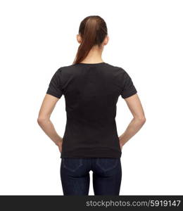 t-shirt design, advertisement and people concept - smiling woman in blank black t-shirt