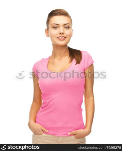 t-shirt design and breast cancer awareness concept - smiling woman in blank pink t-shirt