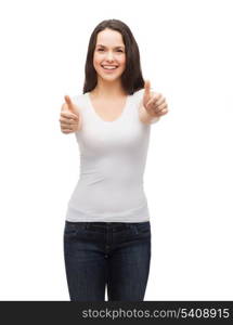 t-shirt design and happy people concept - smiling teenager in blank white t-shirt showing thumbs up