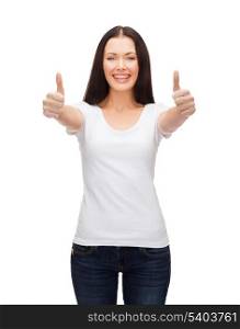t-shirt design and happy people concept - smiling woman in blank white t-shirt showing thumbs up