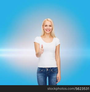 t-shirt design and happy people concept - woman in blank white t-shirt showing thumbs up