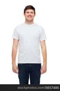 t-shirt design and people concept - smiling young man in blank white t-shirt