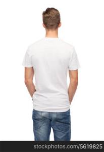 t-shirt design and people concept - young man in blank white t-shirt from back