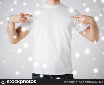 t-shirt design concept - man in blank white t-shirt