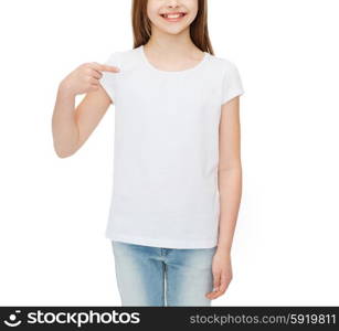 t-shirt design concept - smiling little girl in blank white t-shirt pointing at herself. smiling little girl in blank white t-shirt