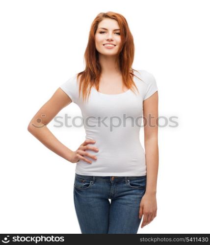 t-shirt design concept - smiling teenager in blank white t-shirt and jeans