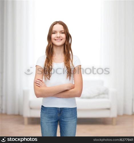 t-shirt design concept - smiling teenager in blank white t-shirt with crossed arms