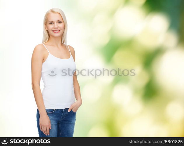 t-shirt design concept - smiling woman in blank white tank top