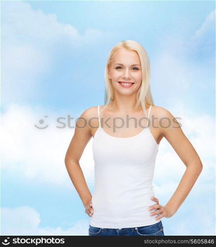 t-shirt design concept - smiling woman in blank white tank top