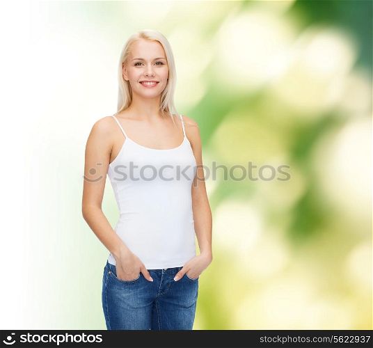 t-shirt design concept - smiling woman in blank white tank top