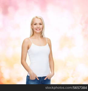 t-shirt design concept - smiling woman in blank white tank top