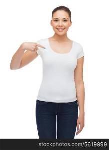 t-shirt design concept - smiling young woman in blank white t-shirt pointing finger on herself