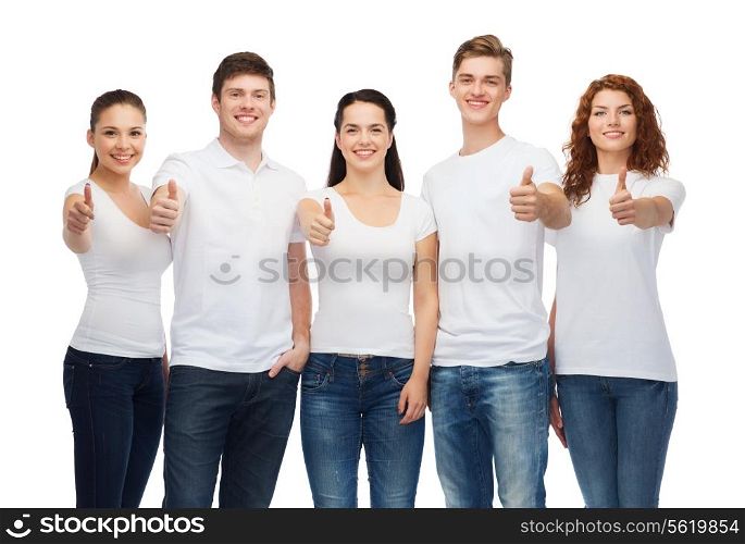 t-shirt design, gesture and people concept - group of smiling teenagers in blank white t-shirts showing thumbs up