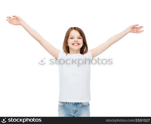 t-shirt design, happiness, freedom, future concept - smiling teenage girl in blank white t-shirt with raised hands