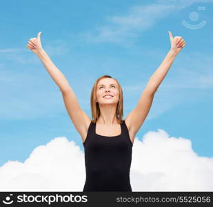 t-shirt design, happy people concept - smiling woman in blank black tank top showing thumbs up