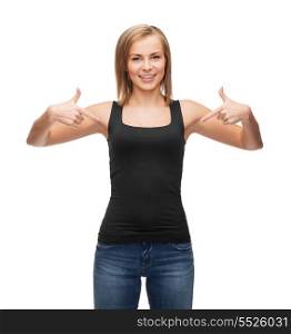 t-shirt design, happy people concept - smiling woman in blank black tank top pointing her finger at herself