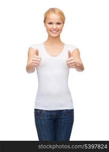 t-shirt design, happy people concept - woman in blank white t-shirt showing thumbs up