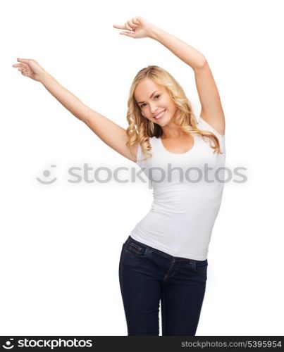 t-shirt design, harmony, happiness concept - happy dancing woman with raised hands in blank white t-shirt