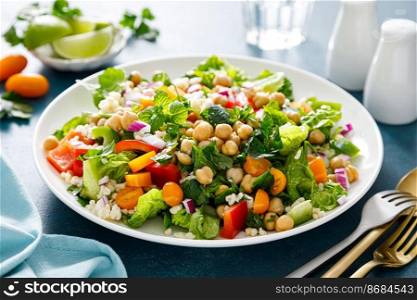 Tabbou≤h salad. Tabouli salad with fresh pars≤y, onions, tomatoes, bulgur andχckpea. Hea<hy ve≥tarian food, diet