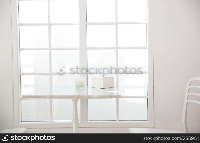 table and chair in white