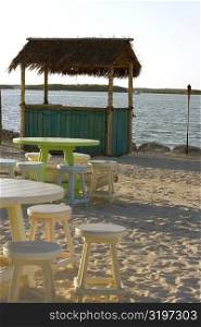 Table and chairs on the beach, Miami, Florida, USA