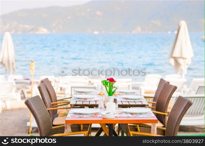 table cafe on the beach near the sea