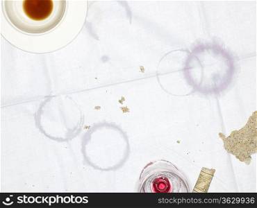 Table Cloth with Empty Cup and Glass and Moisture Rings