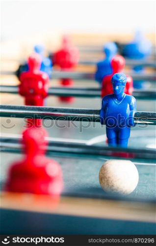Table football game sport competition two competitors players on field. Closeup of players