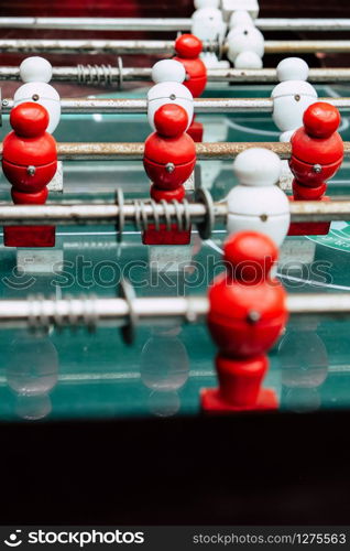 Table football game with red and white players