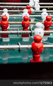 Table football game with red and white players