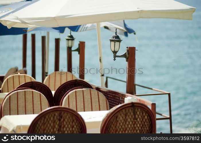 Table in a restaurant by the sea.