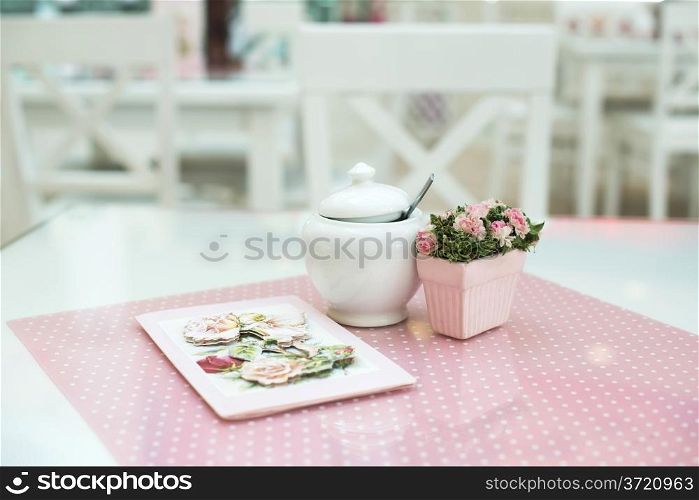 Table in confectionery. Close up pink table