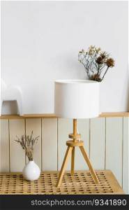 Table l&, lavender in a white vase in the decor of the living room in a minimalist Scandinavian style