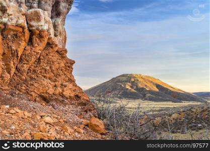 Table Mountain in sunset light , Red Mountain Open Space in northern Colorado in fall scenery