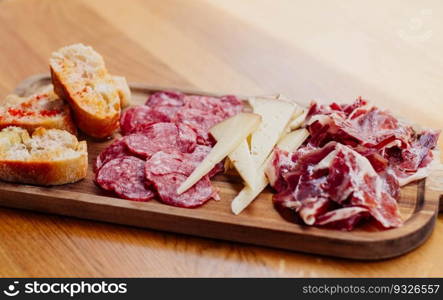 Table of Iberian sausages and Manchego cheeses